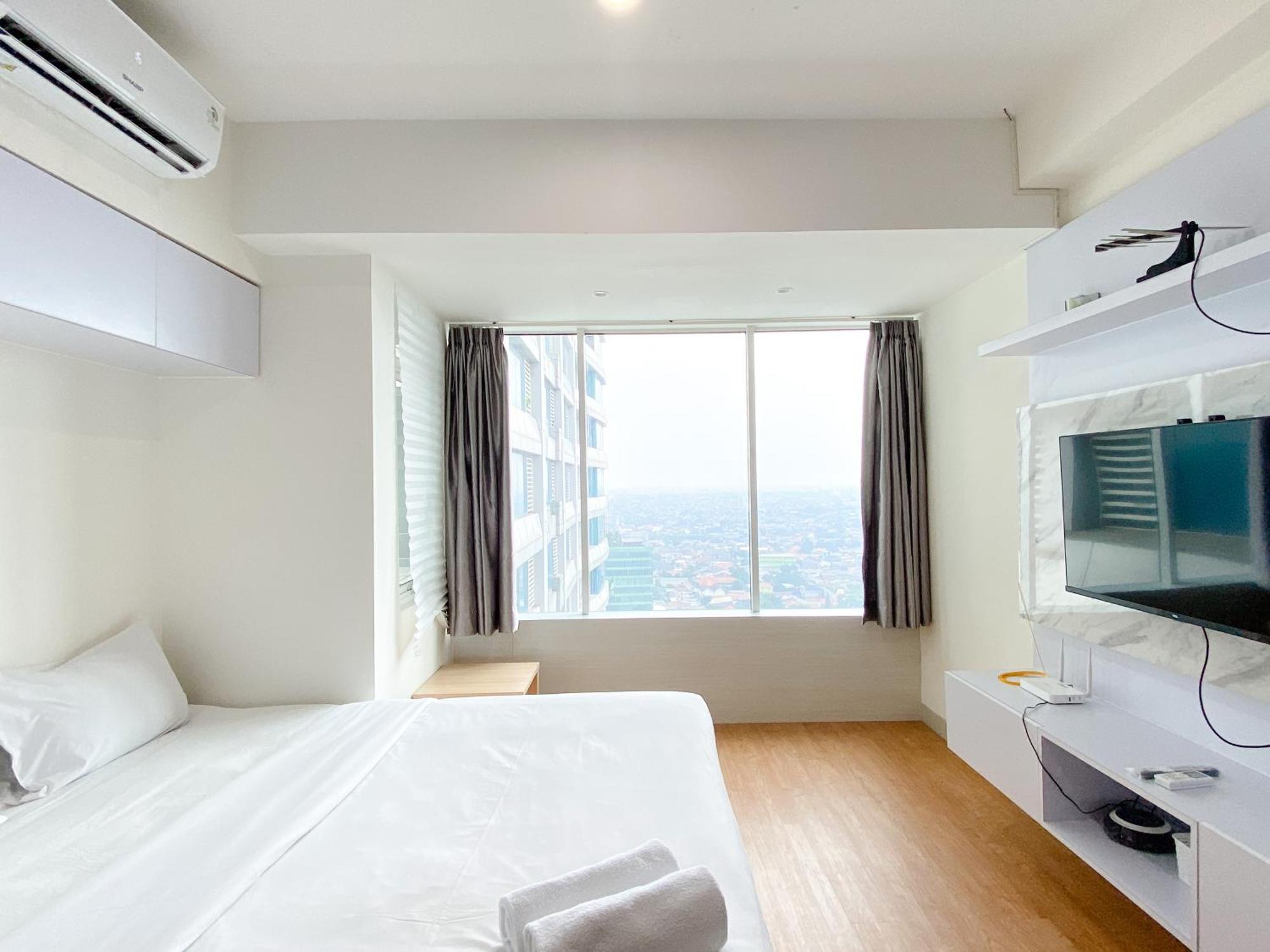 Modern At Grand Kamala Lagoon By Travelio Bekasi